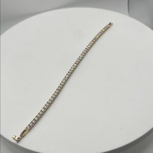 504.Gold Plated over Stainless Steel Tennis Bracelet w/ Swarovski Crystals.
